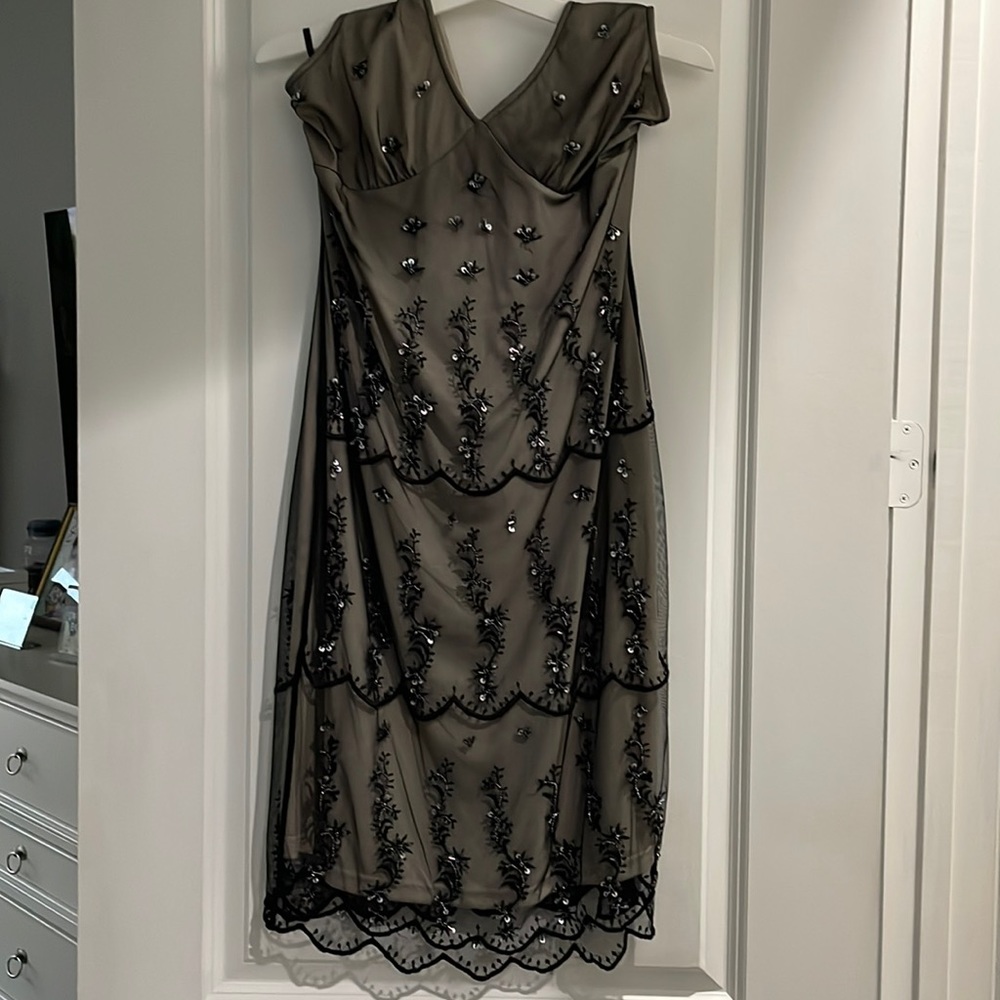 Woman black, and beige dresse
